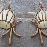 Pair of Louis Sognot rattan wall lights.
