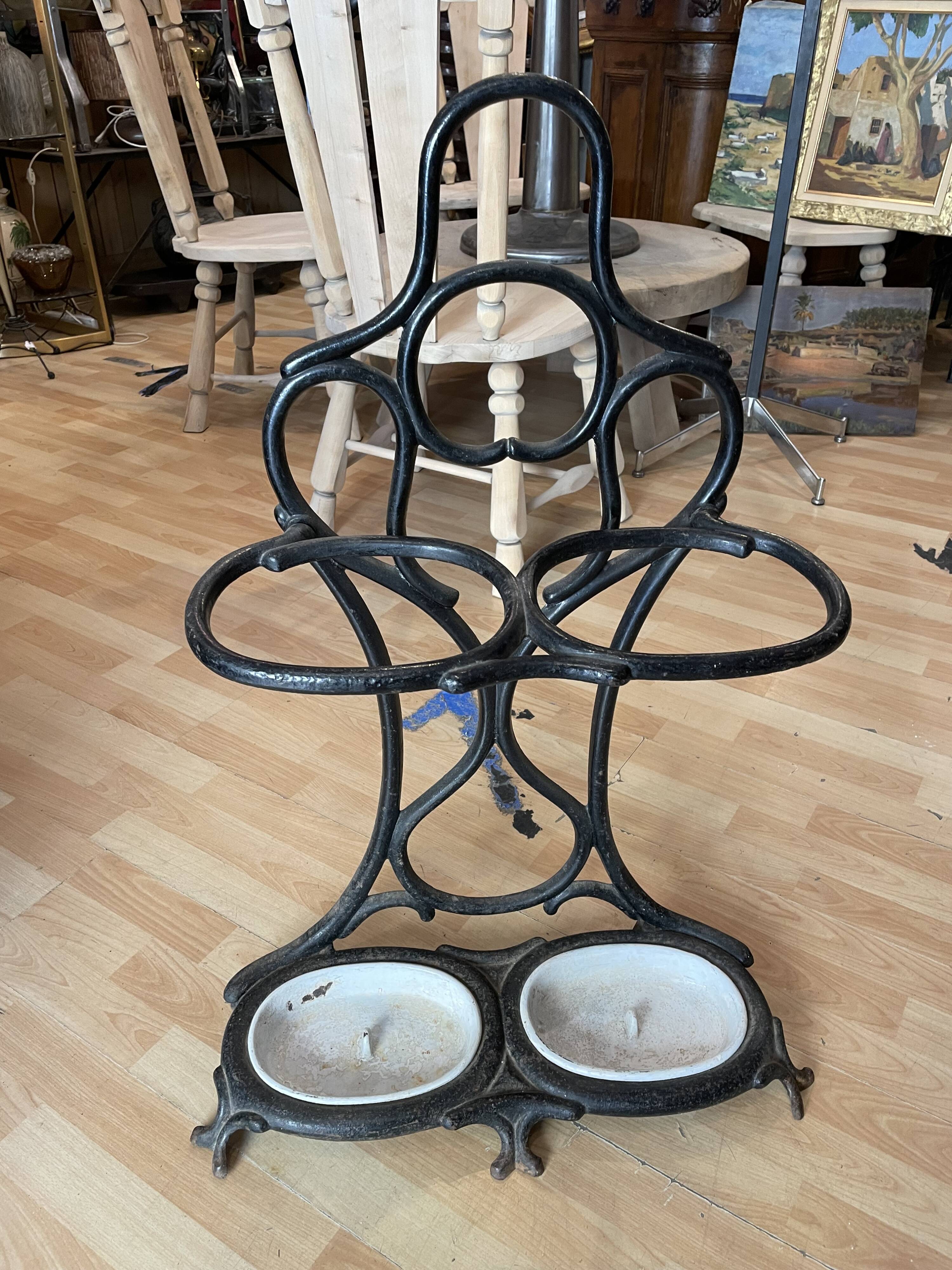 Umbrella holder and cane holder