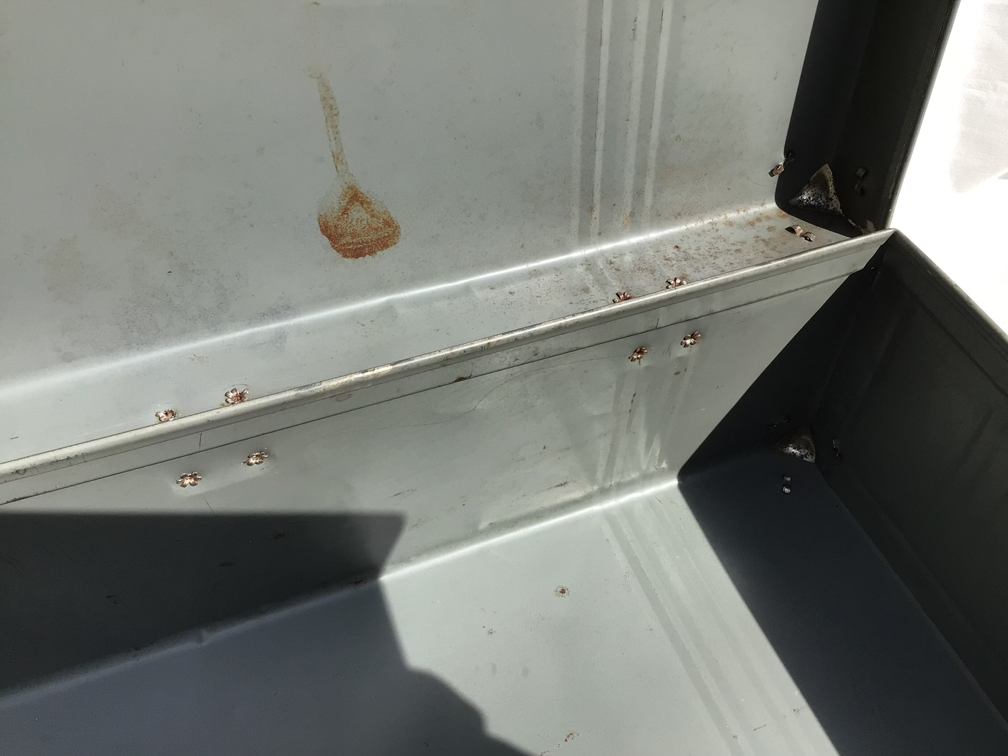 Vintage dark grey metal suitcase