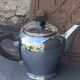 Coffee service consisting of three pieces in chrome and bakelite vintage