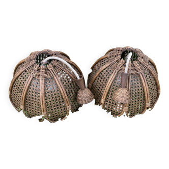 Duo of rattan and glass chandeliers