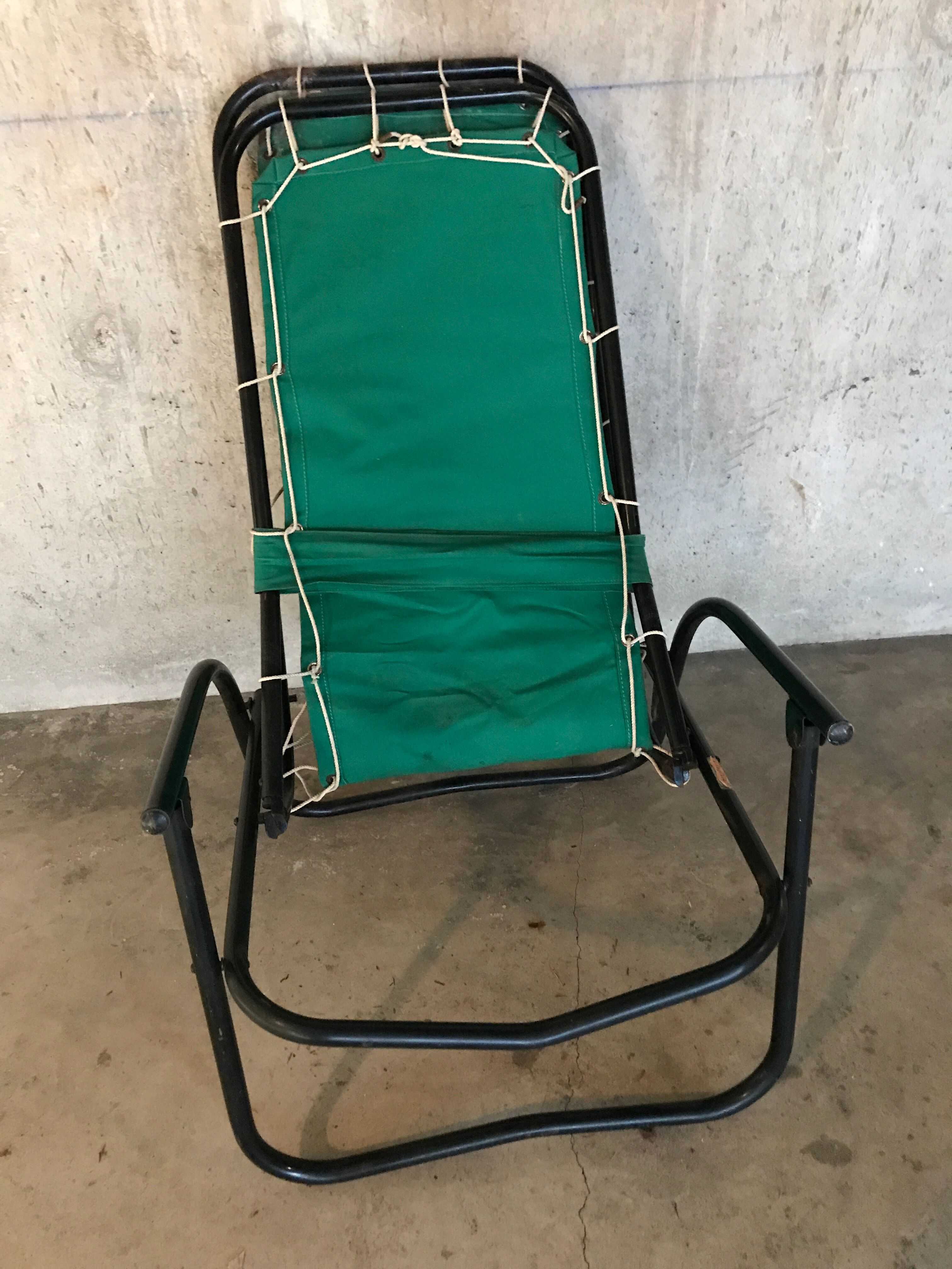 Green fabric and black metal tube long chair