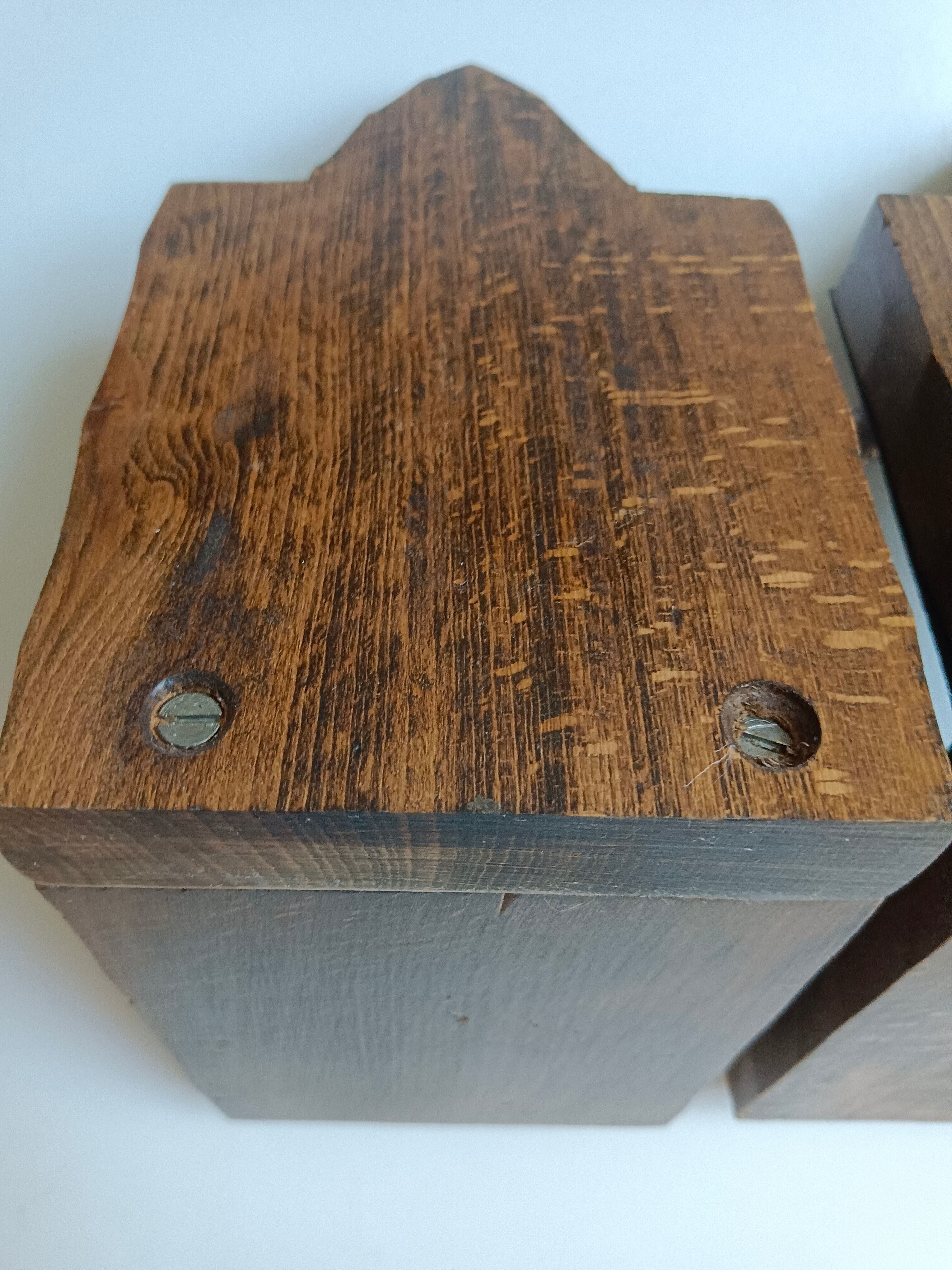 Medieval-style bookends, antique door handle.