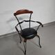 Italian postmodern turnable wrought iron dining chairs with leather seats