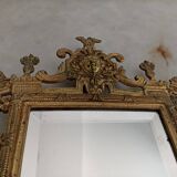 Napoleon III wall mirror with 3 bronze candlesticks and antique figures