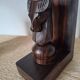 Pair of vintage wooden bookends with stylised horse heads.