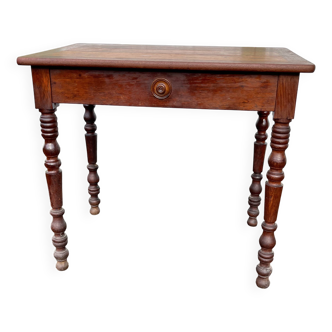 Wooden side table with turned legs