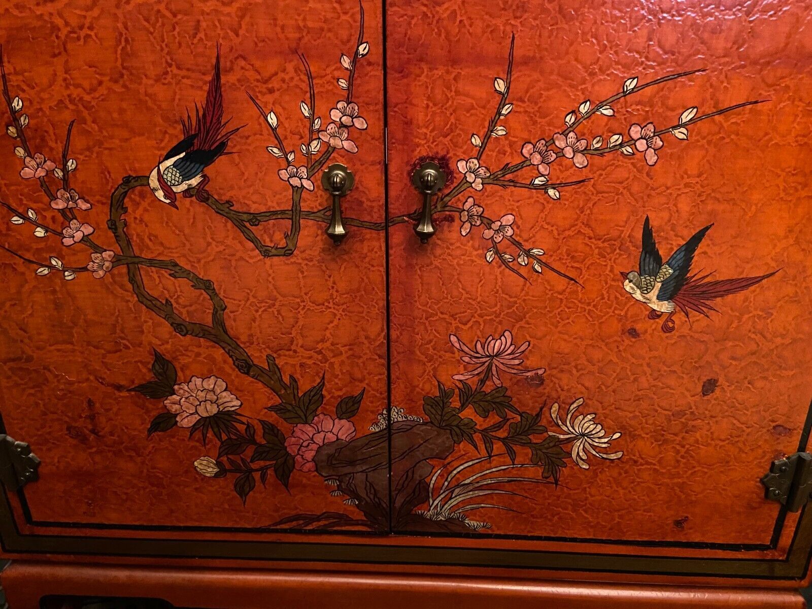 Low sideboard with lacquered decoration with birds on orange background Far East China Japan