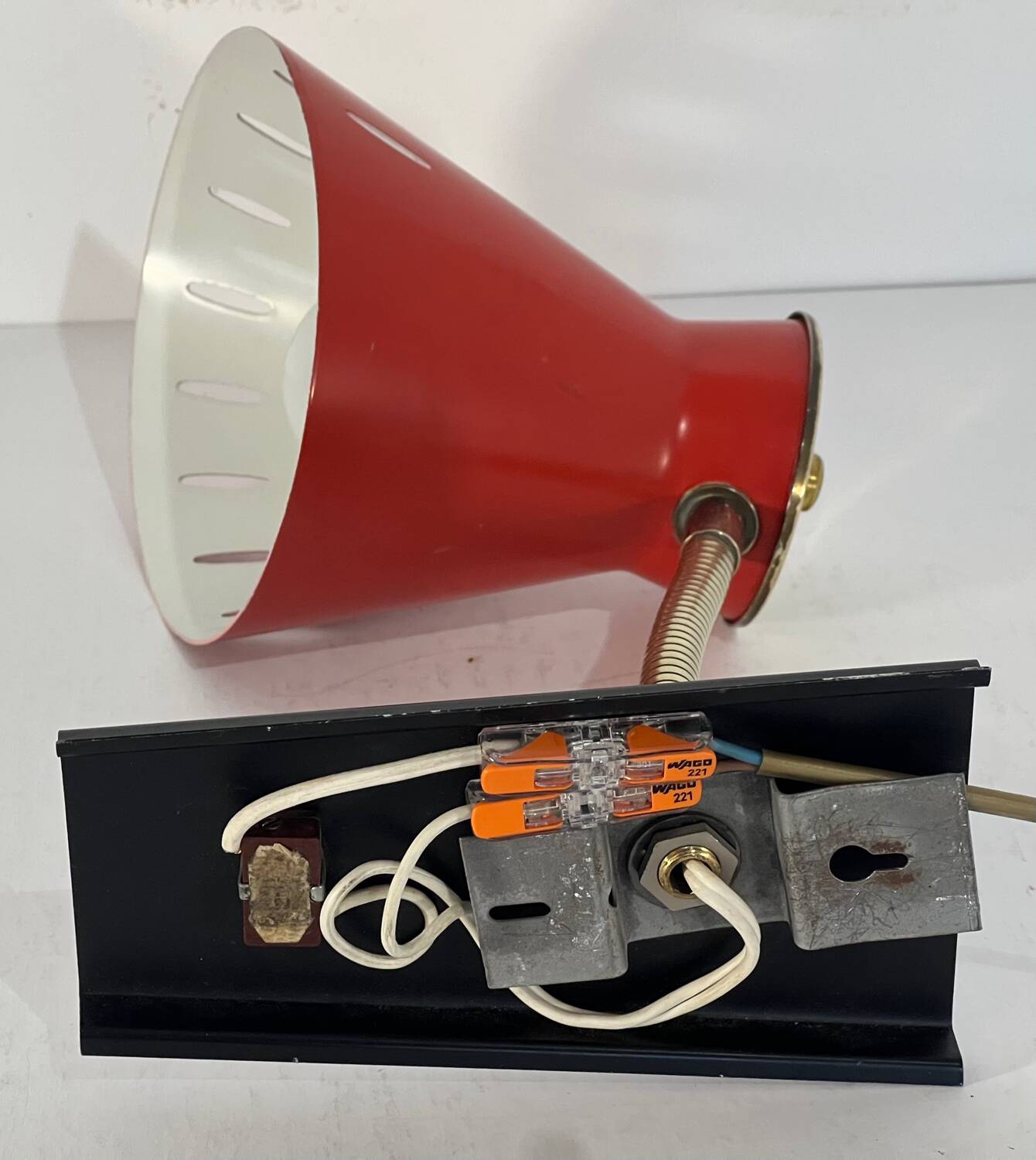 Vintage diabolo wall sconce in the style of René Mathieu