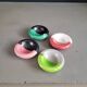 Set of 4 small individual ceramic ashtrays