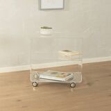 Wonderful side table from the 1960s, high-quality frame and shelf made of transparent acrylic with chrome-plated castors
