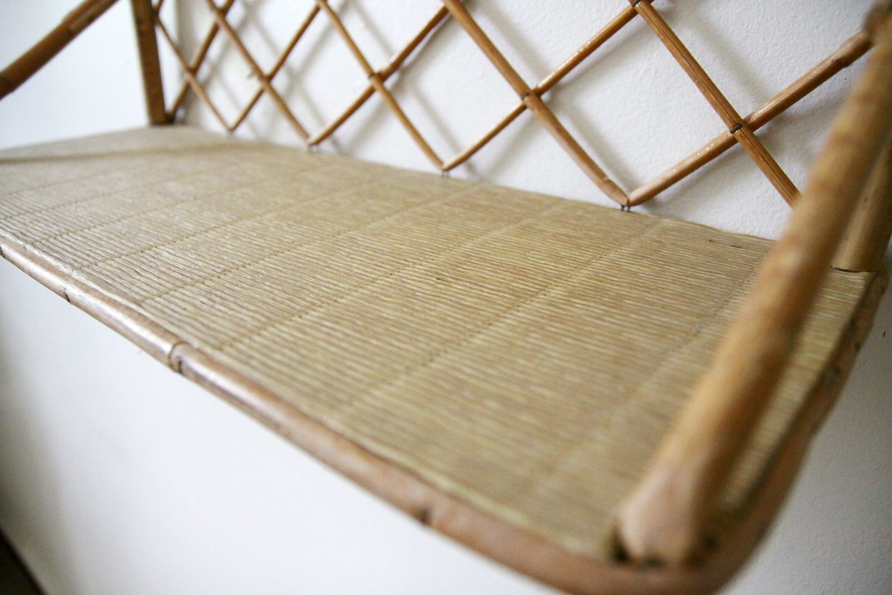 Rattan wall shelf