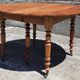 Extendable round table (with extensions and flaps), cherry wood.