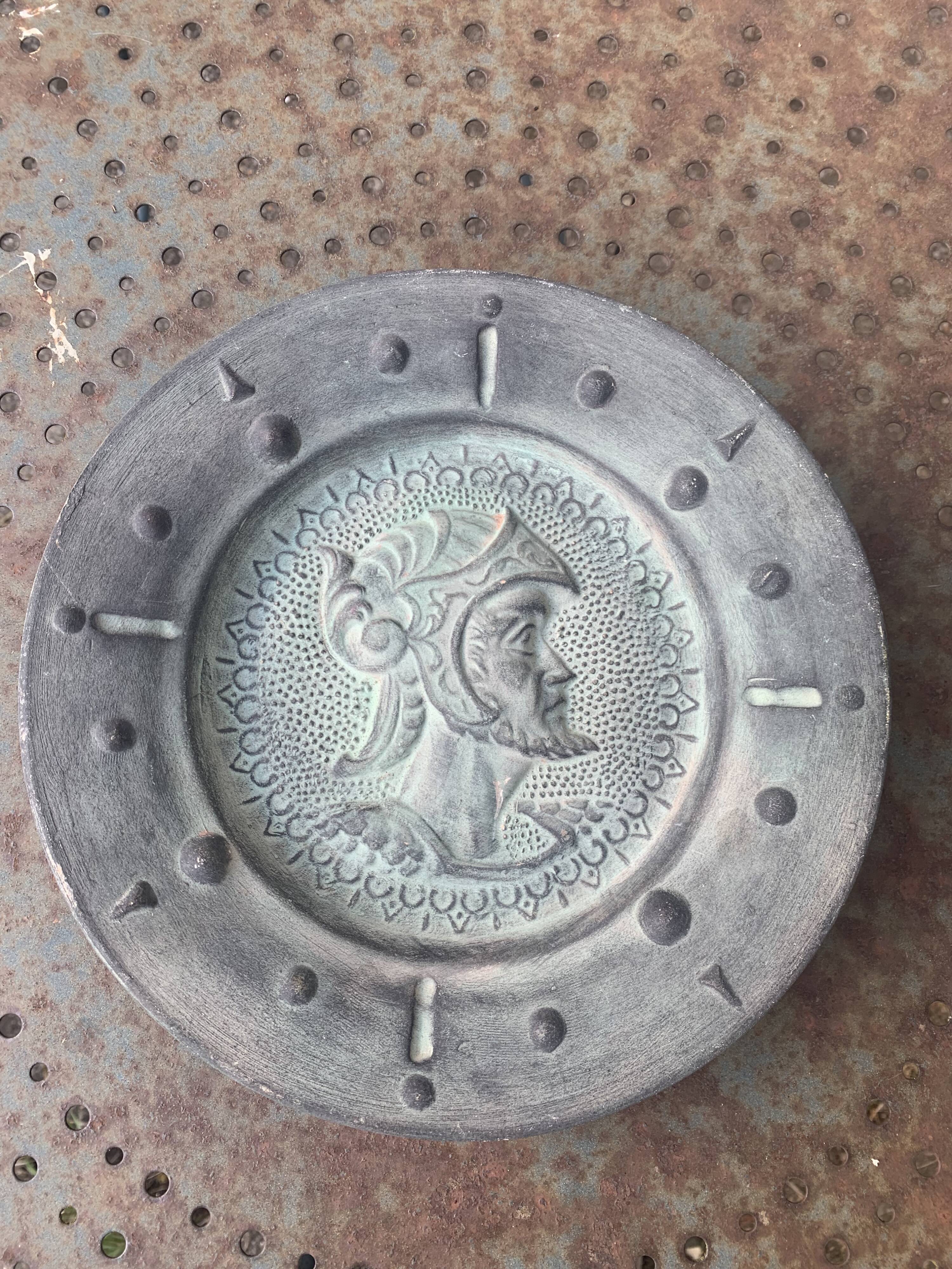 Decorative plate of a Greco-Roman soldier, terracotta, vintage