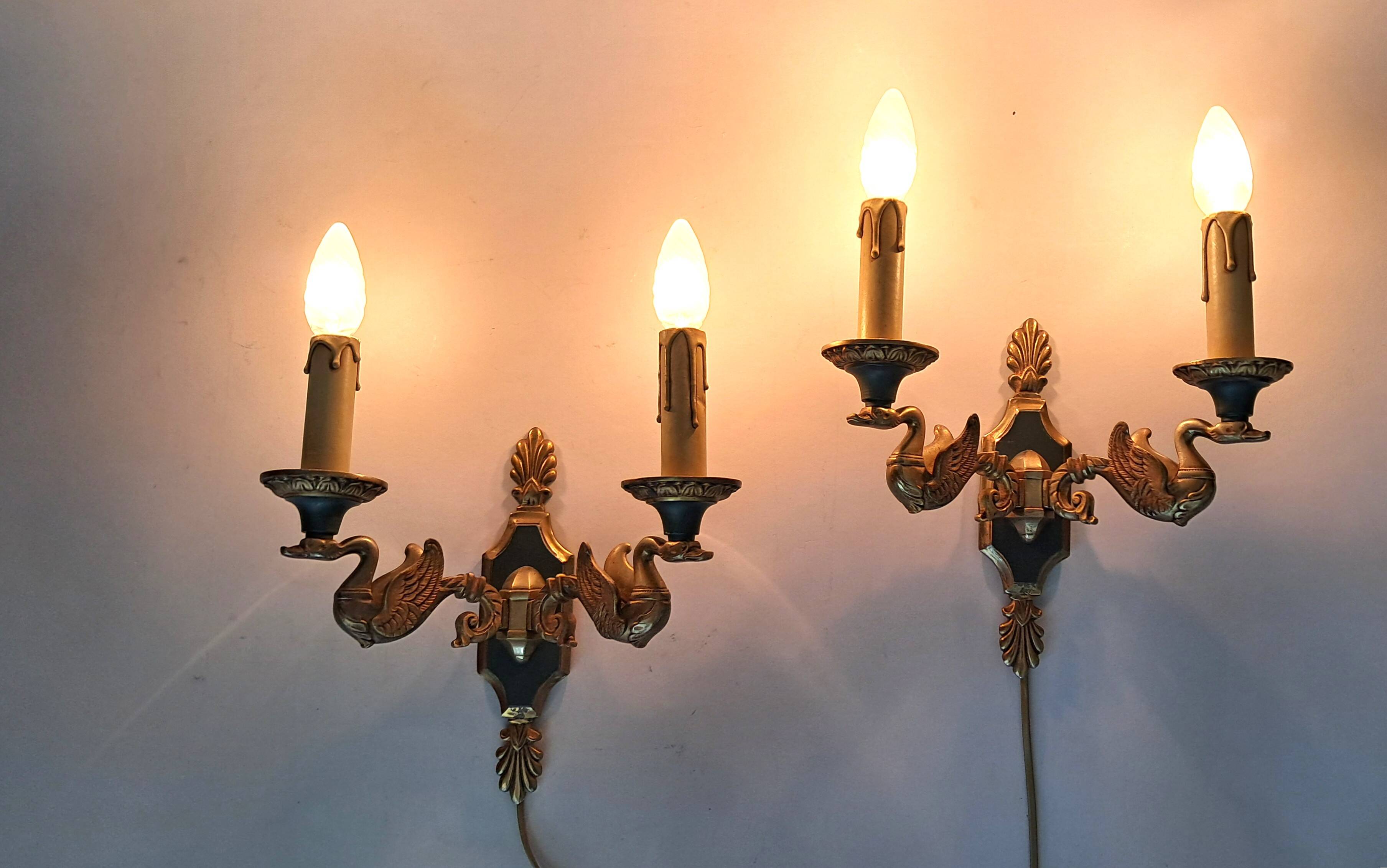 Pair of gilded bronze and green lacquer wall sconces by Maison Lucien Gau, Paris.