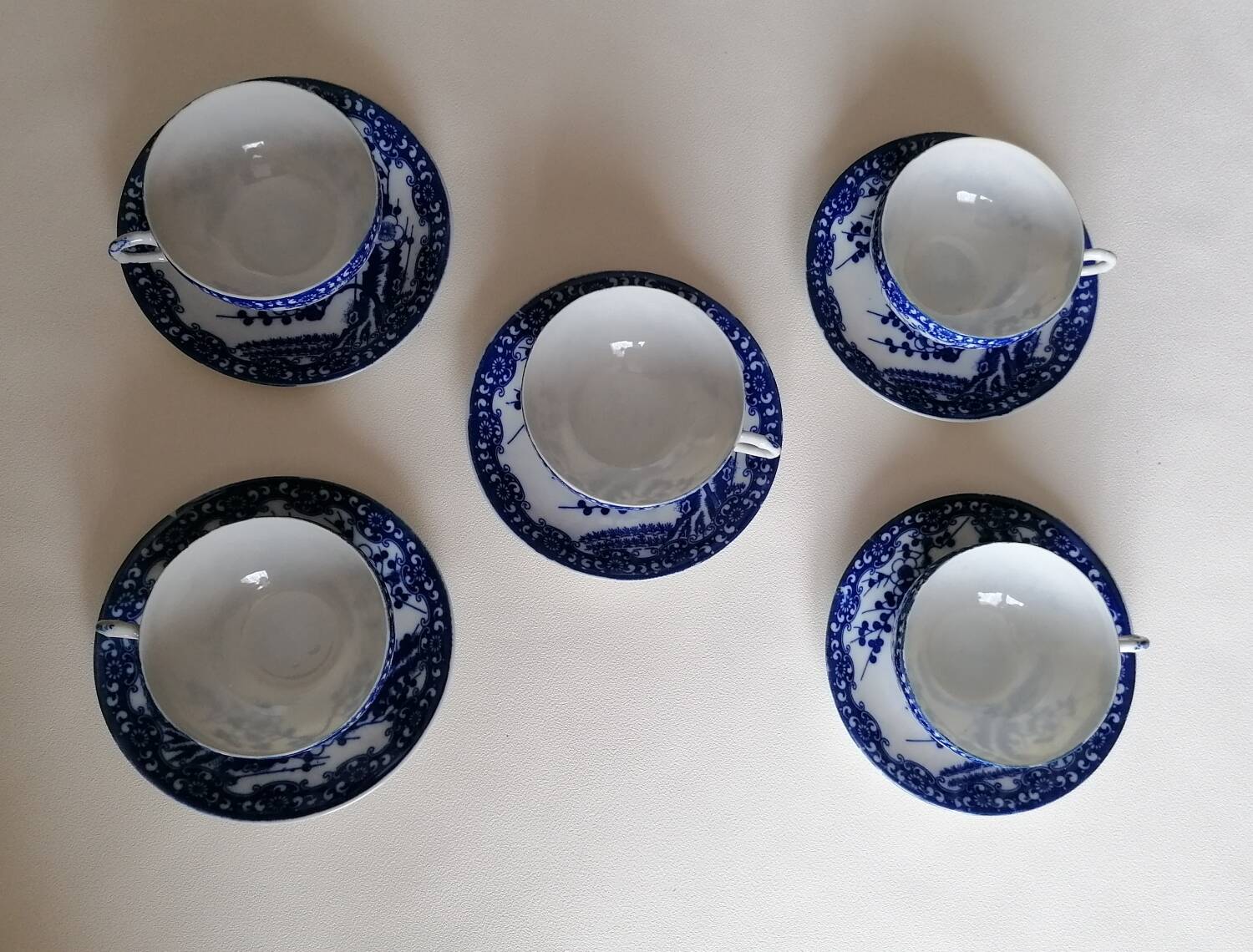 5 white and blue Japanese porcelain tea cups