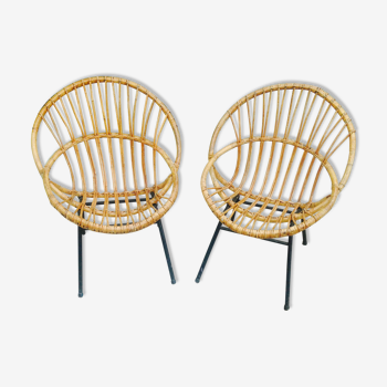 Pair of armchairs in rattan basket with vintage black metal legs