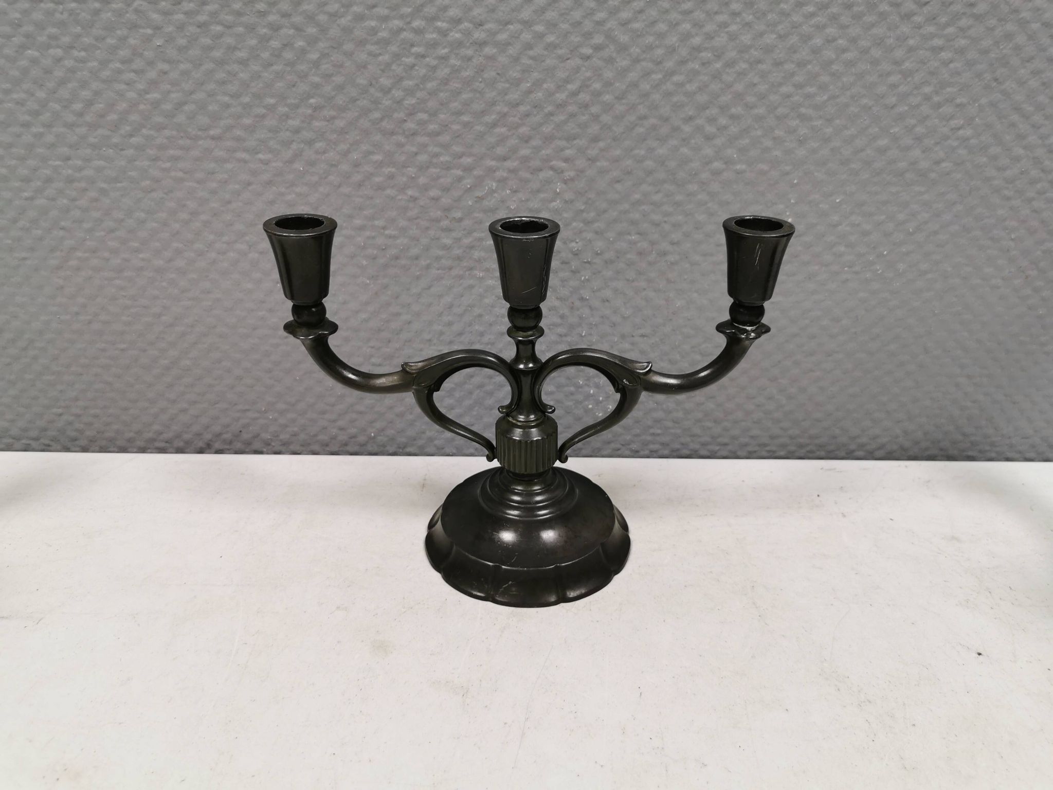 Three-armed candlesticks by Just Andersen, in Disco metal, Denmark, 1950s