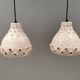 Two ceramic hanging lamps, in creamy white color, looking almost like coral
