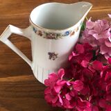 Porcelain pitcher with flowers