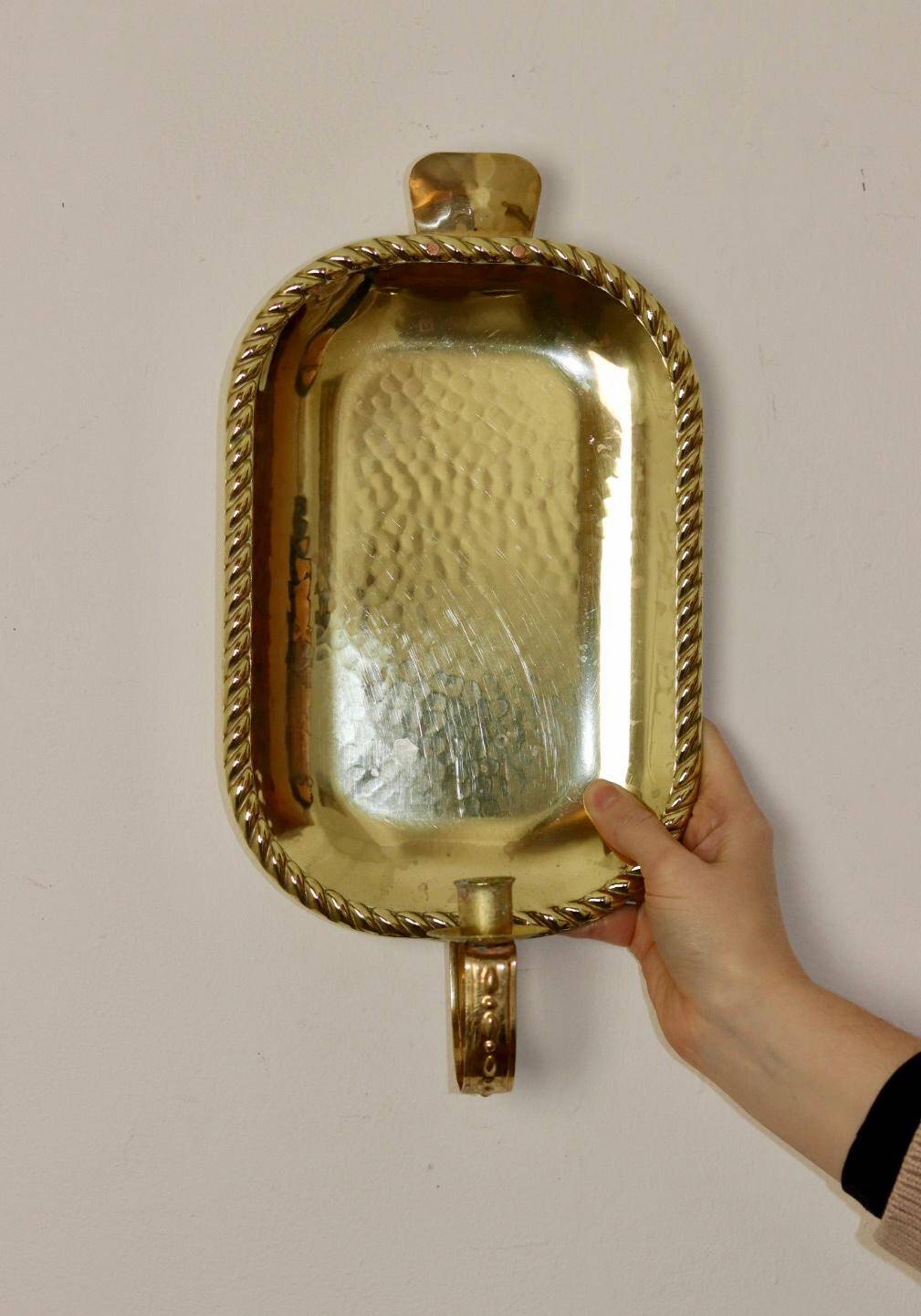 Pair of Swedish brass wall sconces from the mid-century.