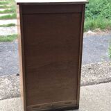 Brown lacquered wooden industrial cabinet with sliding curtain, 1950s, Czech Republic.