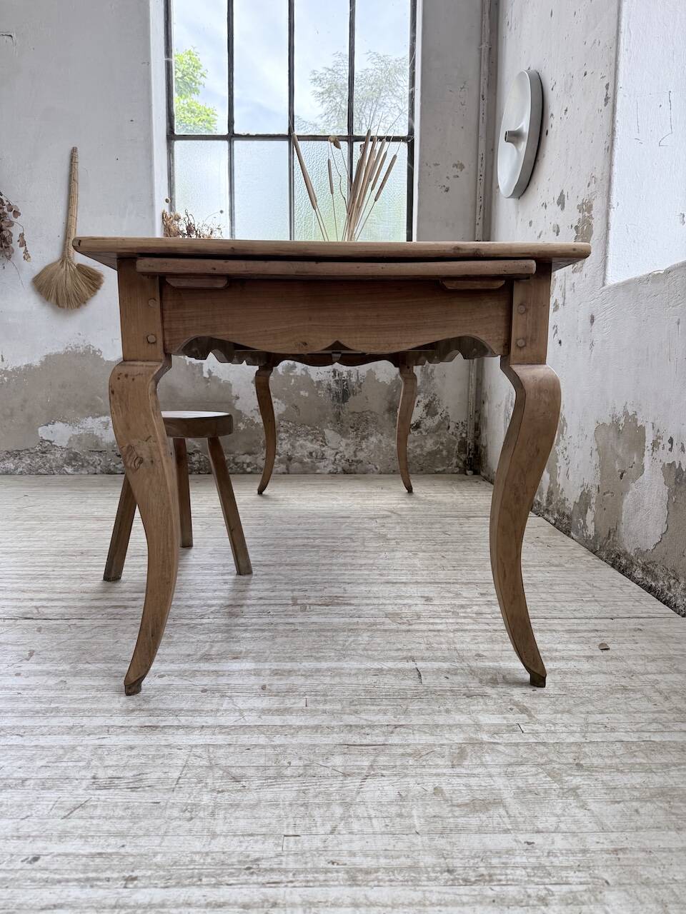 Farm table cherry wood with curved legs, 19th century.