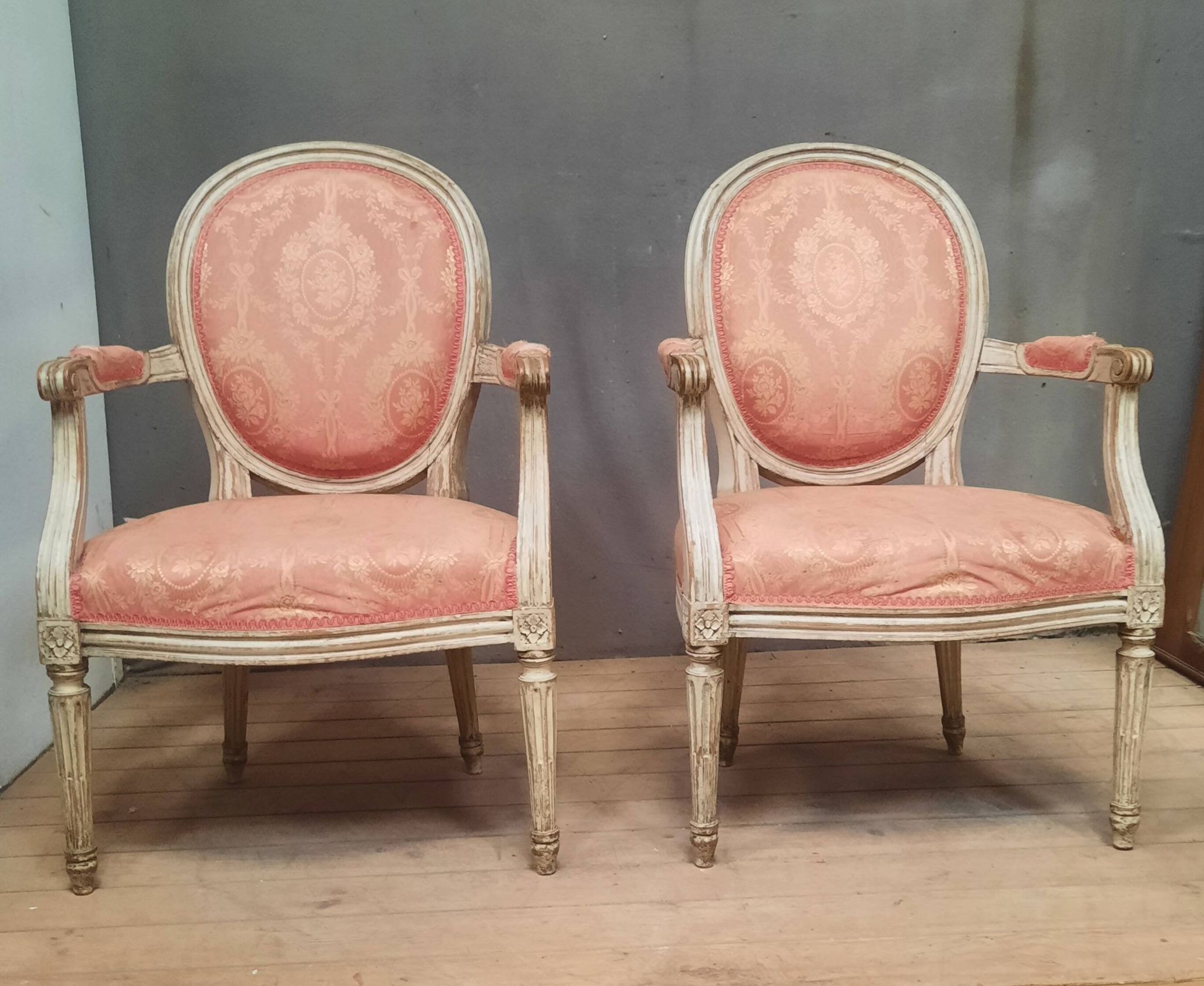 Pair of Louis XVI style medallion armchairs