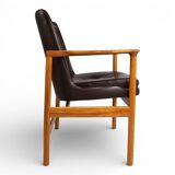 Fröscher leather armchair by Ib Kofod-Larsen, 1960