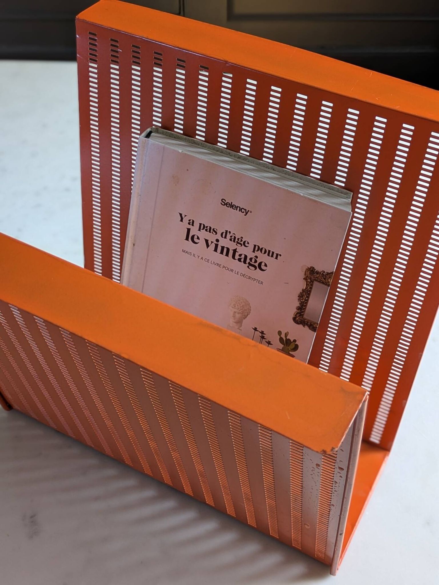 Vintage metal magazine rack in perforated orange/Mathieu Mategot style/70s