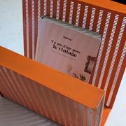 Vintage metal magazine rack in perforated orange/Mathieu Mategot style/70s