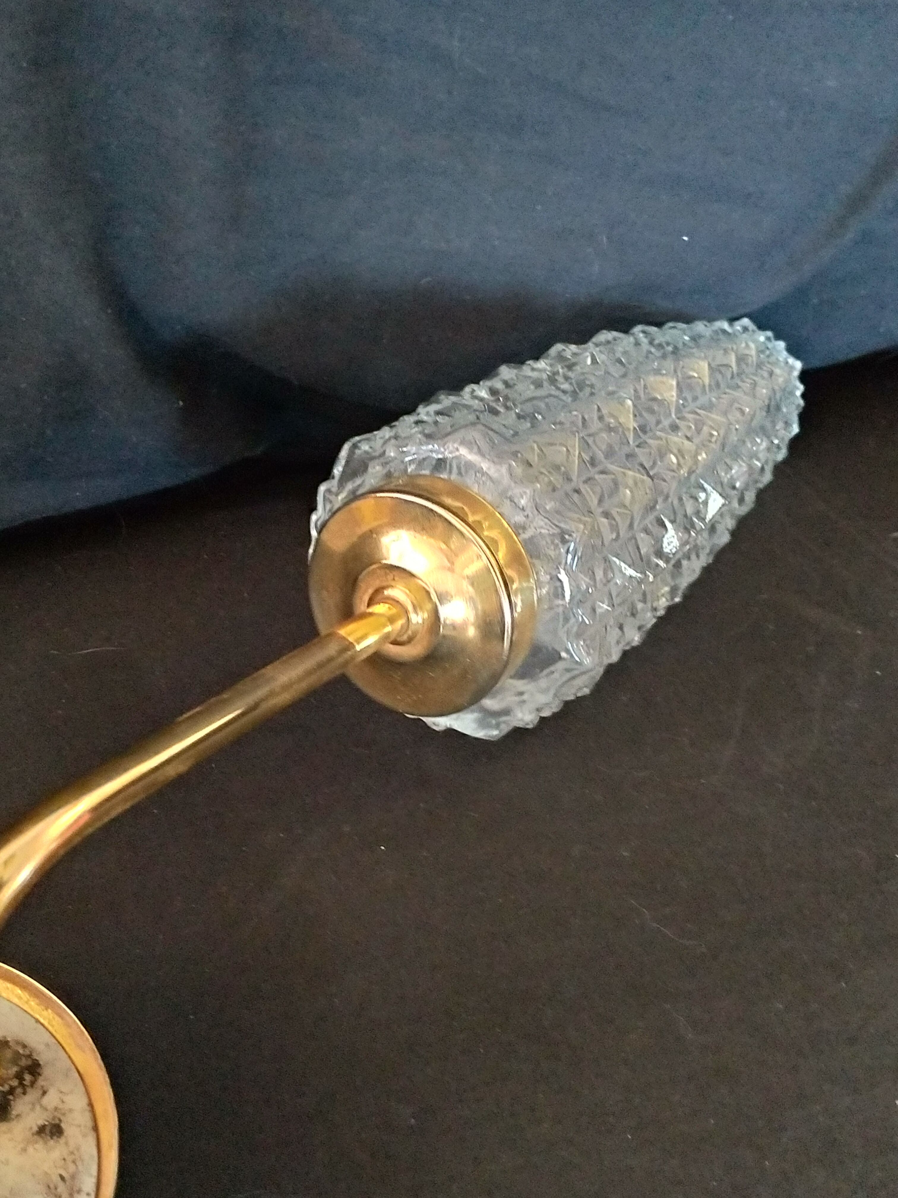 3-spoke brass chandelier and chissed glass