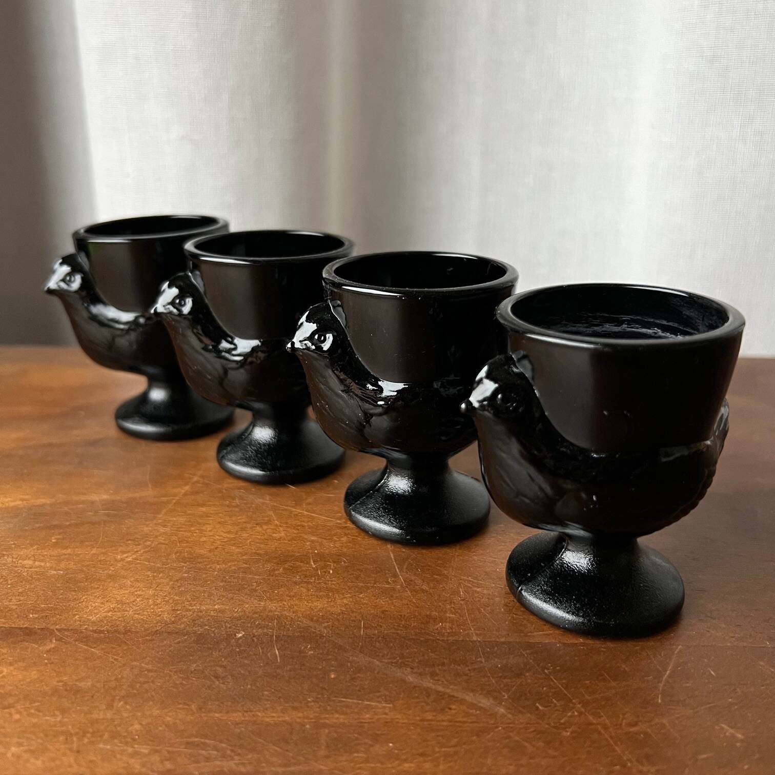 4 "hen" egg cups in black opaline