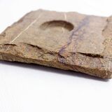 Pair of brutalist travertine candle holders