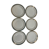 Six slightly hollow Limoges porcelain plates.