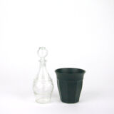 Small bottle with a glass cap with geometric patterns