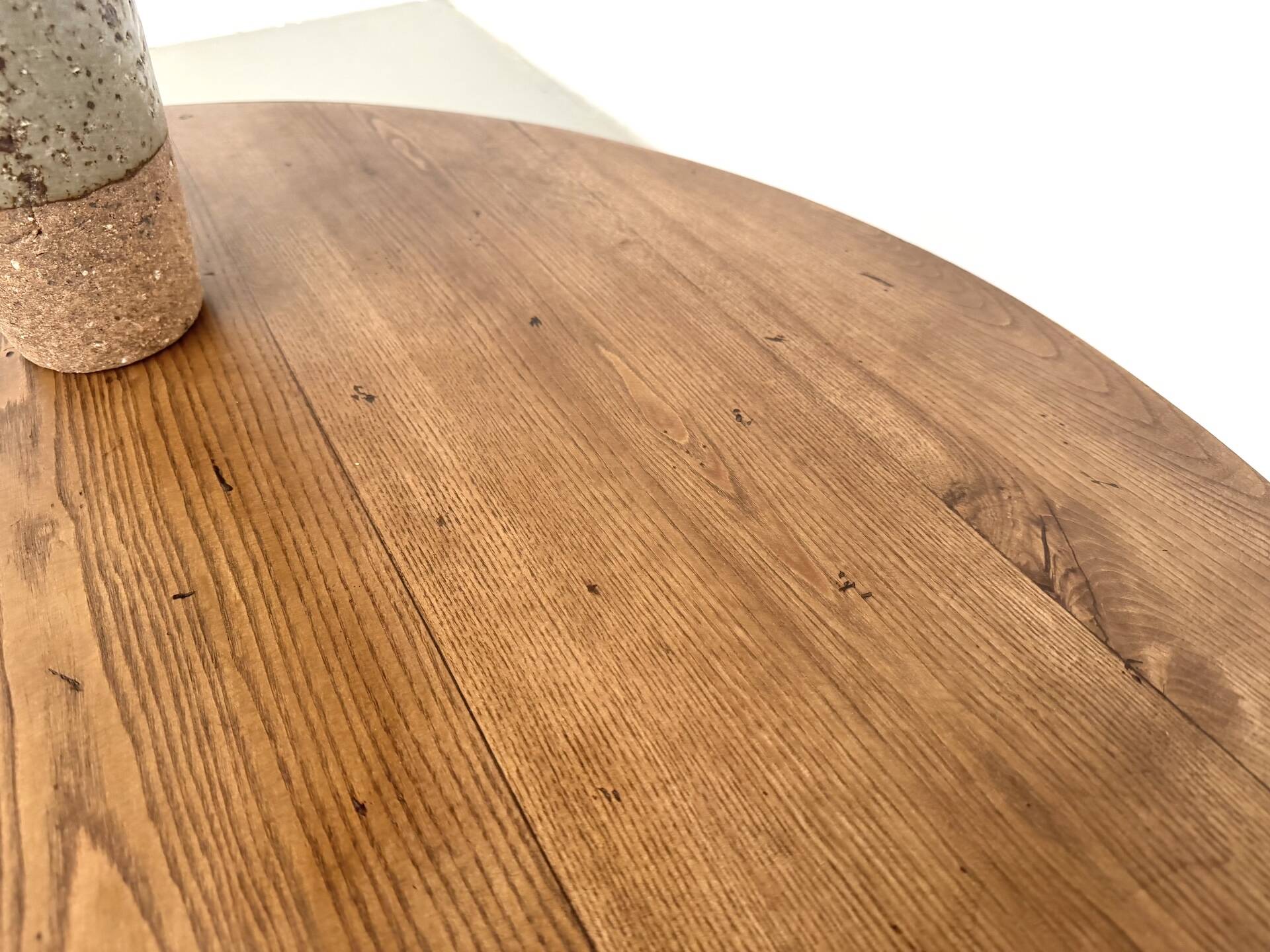 Round coffee table in solid oak, octagonal legs, France, 1950s.