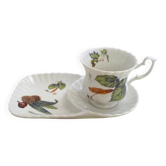 Tea cup, solitary service, naturalistic decoration, in Limoges porcelain.