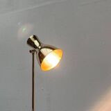 Minimalist brass floor lamp from the mid-century by Dieter Schulz for Wohnbedarf Ag, 1950s.