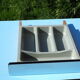 Blue formica table and two stools