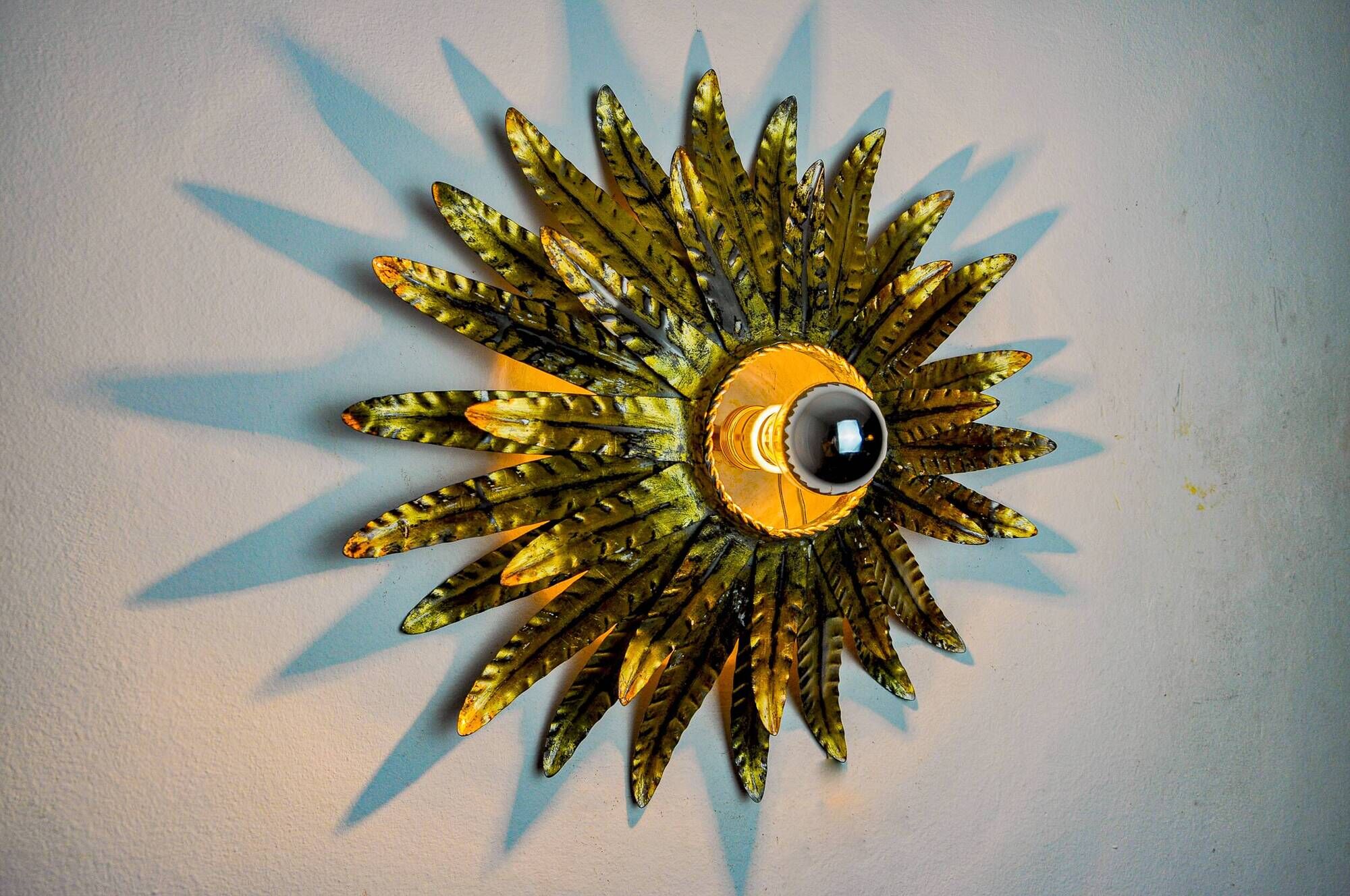 Sun wall lamp by Ferro Arte, metal and gold leaf, Spain 1970