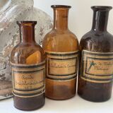 3 amber apothecary bottles