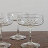 8 glasses of engraved crystal champagne