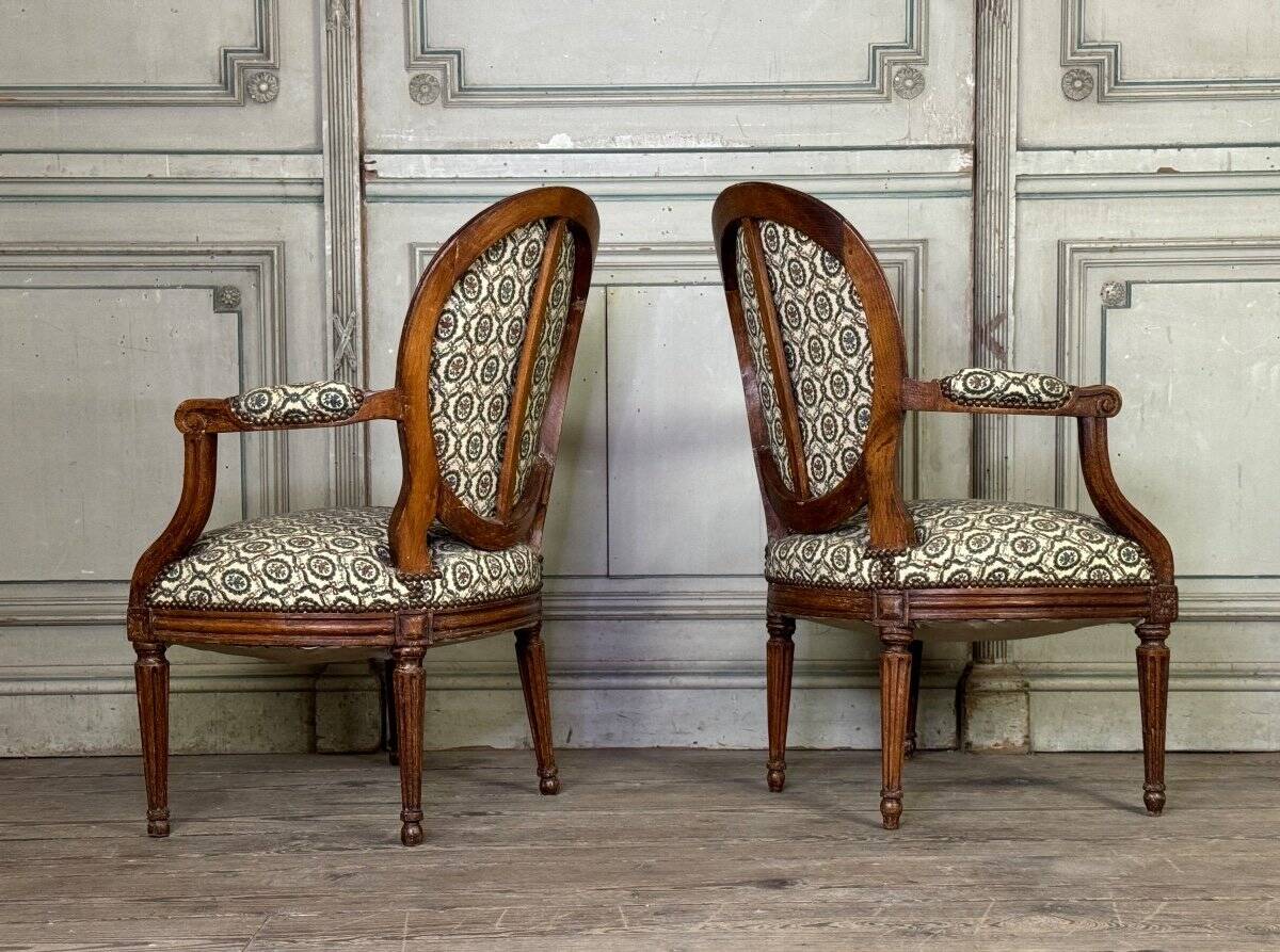 Pair Of Louis XVI Armchairs In Carved Wood, 18th Century