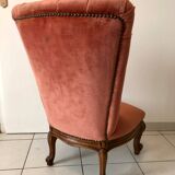 Petit fauteuil capitonné