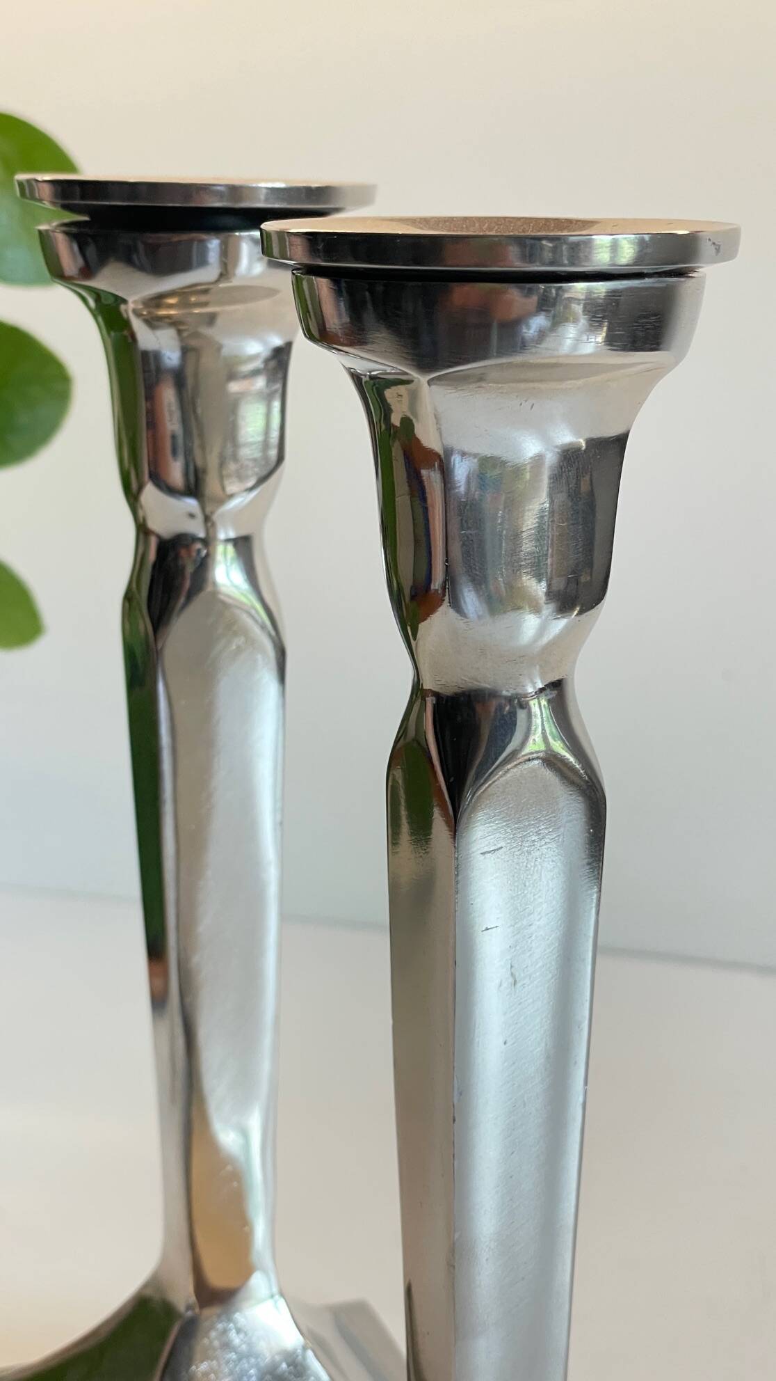 Pair of vintage cast aluminum candlesticks