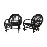 Pair of black lacquered rattan armchairs. France, cira 1960.