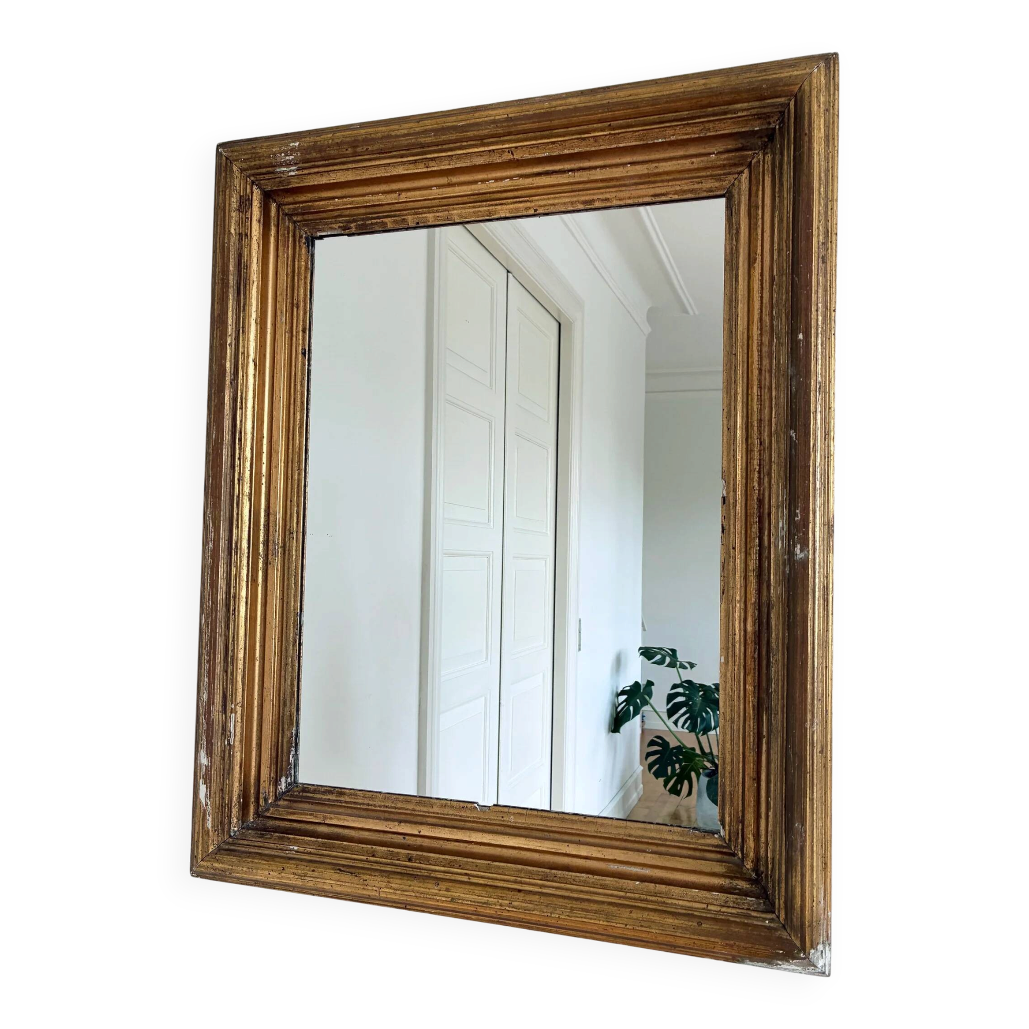Antique giltwood wall mirror in gold