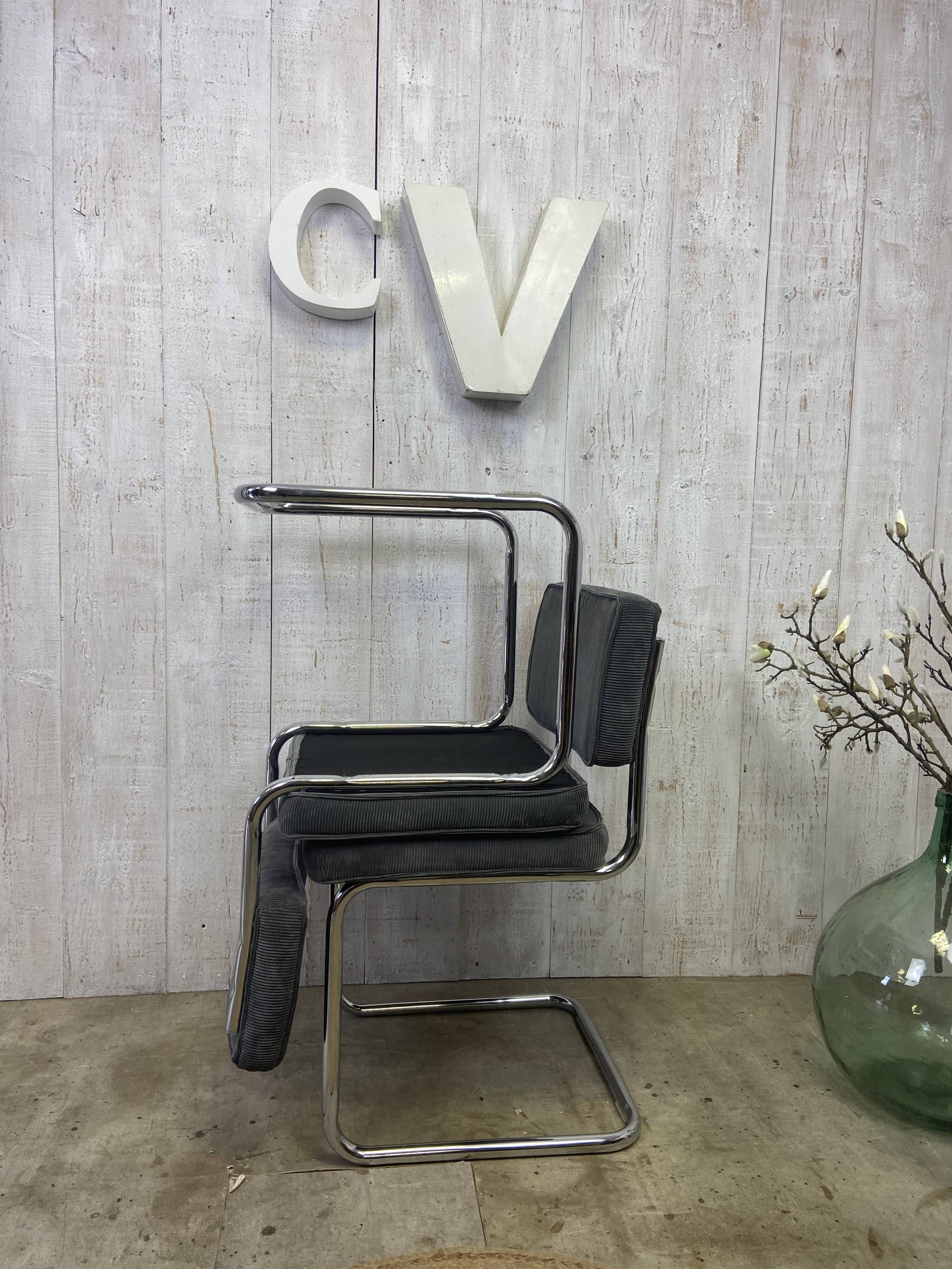 Pair of chrome and velvet chairs