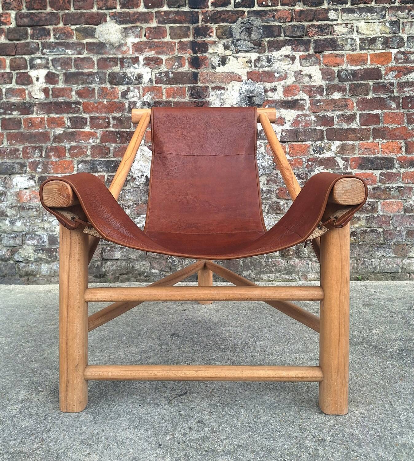 Vintage tripod armchair, designer seating furniture